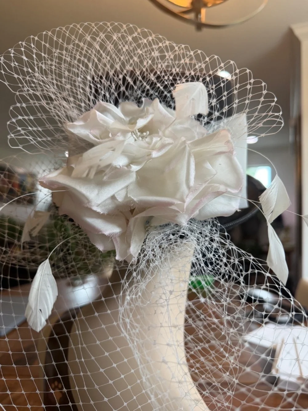 Black Felt Top Hat With White Toole Band, Silk Flowers, Feathers and Netting